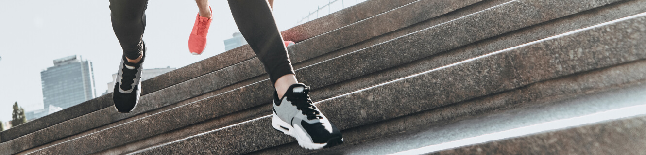 Feet running on stairs.